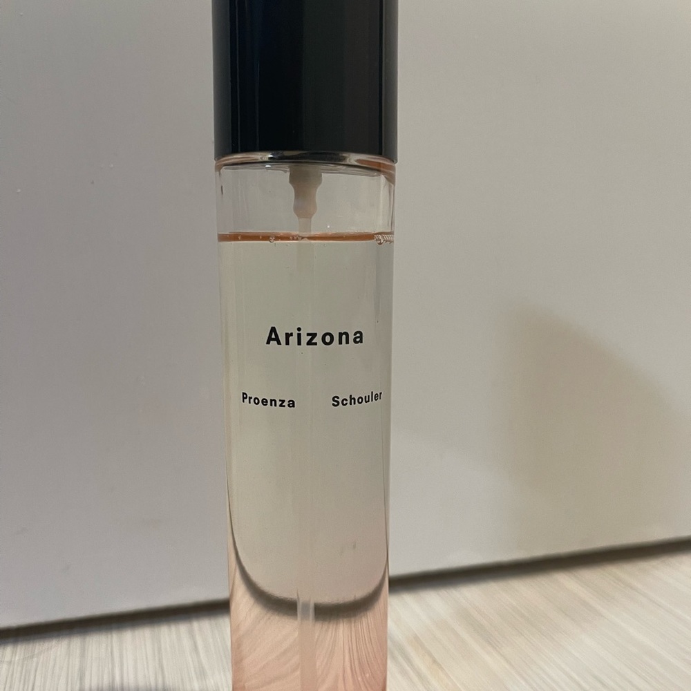 Arizona dry hair and body oil 100 ml bottle - used a couple times from saks